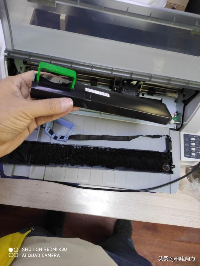 换色带针式打印机怎么换图文教程（怎么安色带芯及更换色带为什么是拧的）